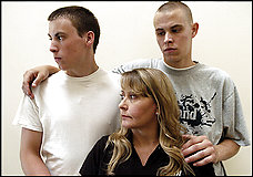 Brandon, left, and Ryan Kenty will drive their mother, Elisa Kelly, to jail Monday, when she is to start a 27-month sentence for providing alcohol at Ryan's 16th birthday party in 2002.